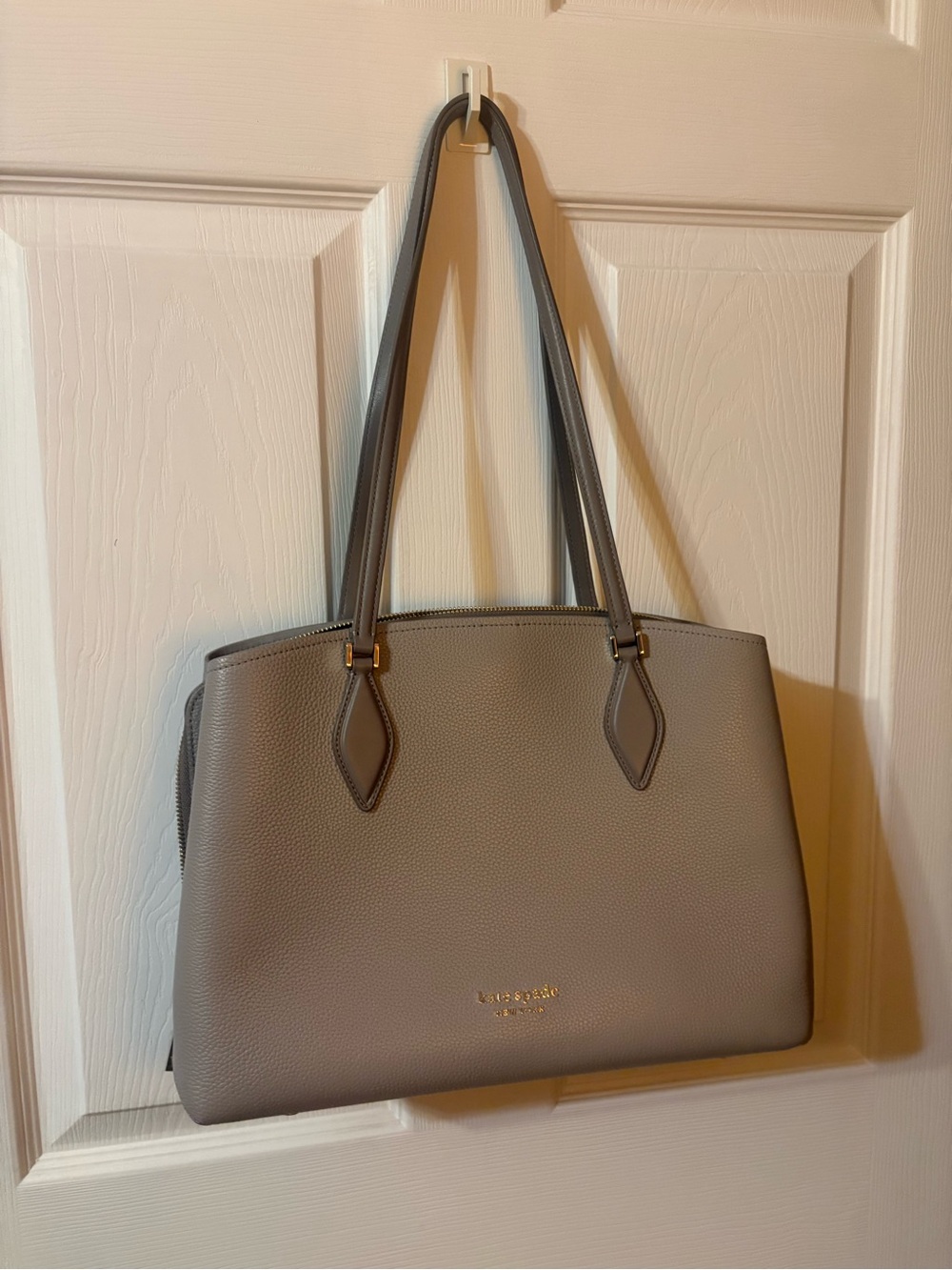 kate spade metallic taupe pebbled leather tote with gold logo